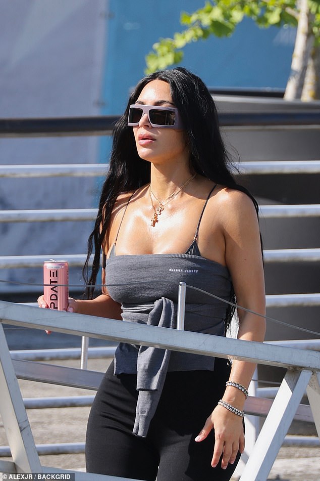 Kim Kardashian, 44, was spotted making a swift exit from Venice on Saturday morning after attending the 'wedding of the century' on Friday