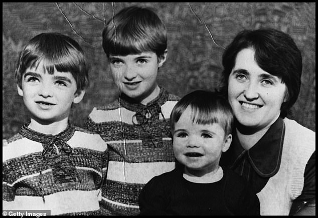 Family Affair: Noel (left) and Liam (second from right) with their brother Paul (middle) and mother Peggy