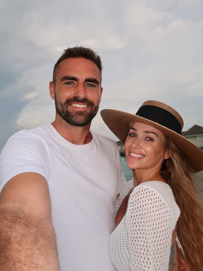 Laura Anderson is slammed for flaunting her 'free holidays' as she returns home from first holiday with Clark Robertson