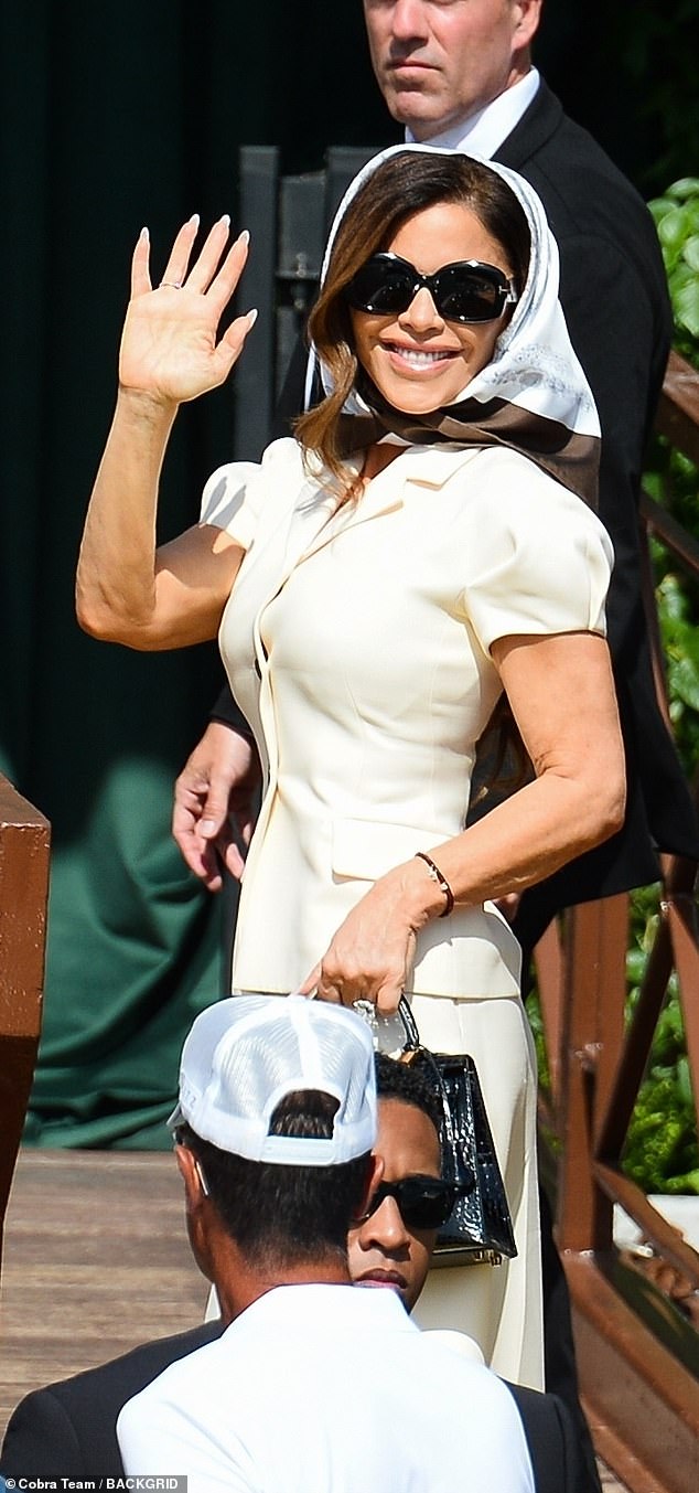 The former journalist and bride-to-be, 55, was photographed walking along a bridge in the island of San Giorgio Maggiore wearing a stunning white headscarf