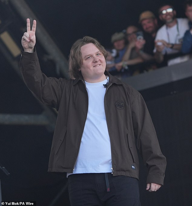 Lewis Capaldi, 28, choked back tears as he declaring 'I'm back baby' during his emotional return to Glastonbury's iconic Pyramid Stage for a secret set on Friday