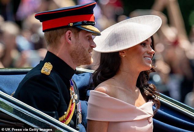 Meghan is pictured with Harry during Trooping The Colour 2018