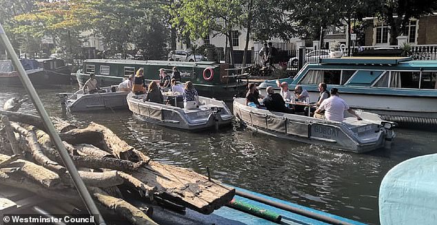Pictured: Groups of people using the rental GoBoats in the west London canal. There is no suggestion they were behaving in an unruly manner