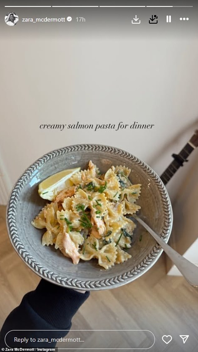 Zara even showed her support for her new boyfriend Louis the night before as she cooked the pair a 'creamy salmon pasta for dinner', as she captured the plate with the singers guitar noticeably in the background