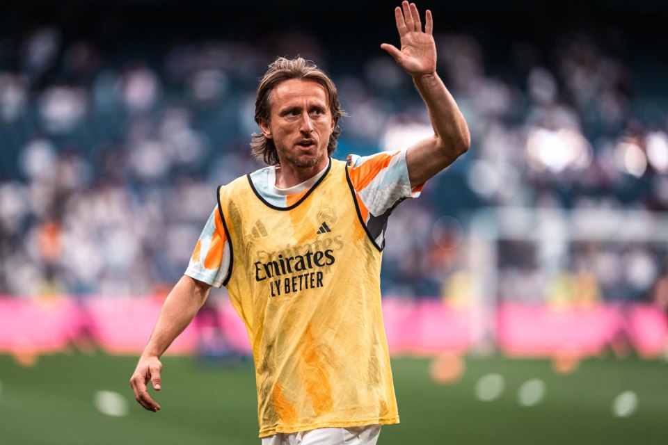 Luka Modric of Real Madrid waving to the crowd.