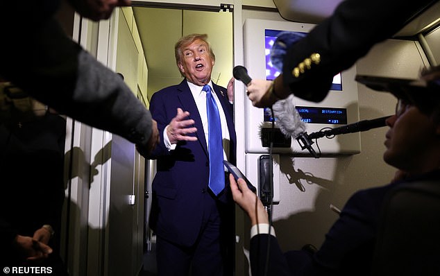 US President Trump talks to reporters aboard Air Force One following his departure from the G7 summit in Canada yesterday