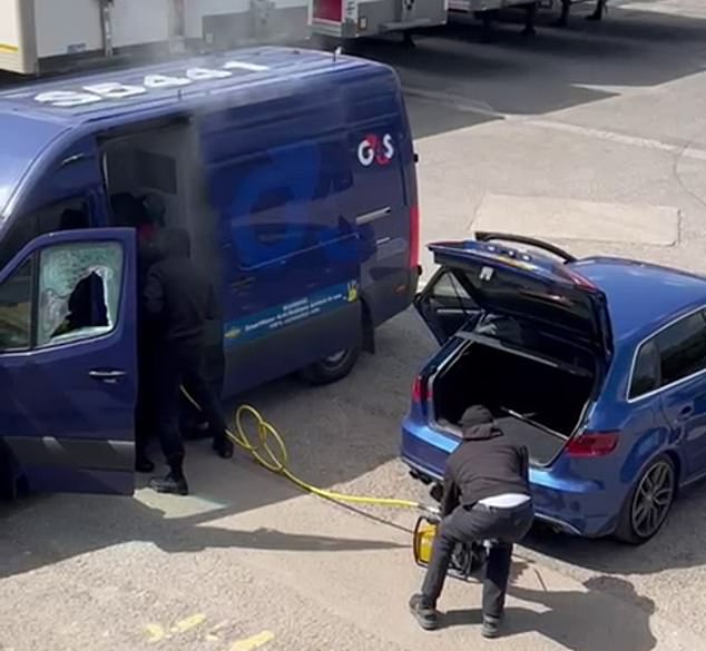 A source who sent the footage to MailOnline said that crew were using specialist equipment to blow the safe