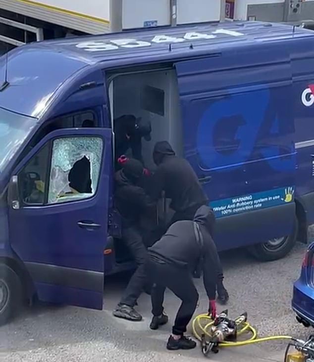 The shocking footage shows the gang working against the clock to break the safe contained in the vehicle as its alarm rang out