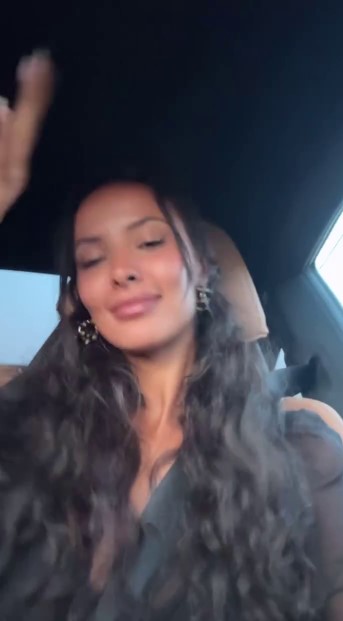 Maya Jama in a car.
