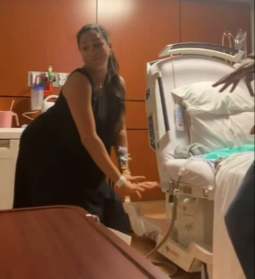 Meghan Markle in a hospital room.