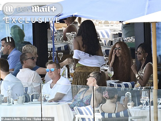 Earlier this week Michelle was spotted having lunch with a surprising date at an exclusive club in Mallorca. Barack, however, was noticeably absent
