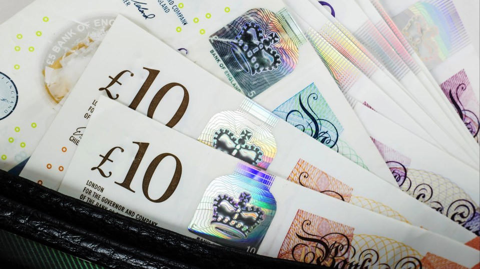 British ten-pound notes in a wallet.