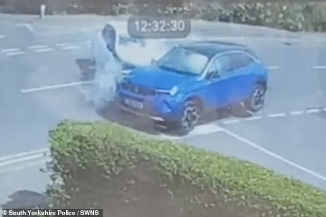 This is the shocking moment a speeding driver leaves a seriously injured woman for dead to pick up £20 notes after ploughing into her car