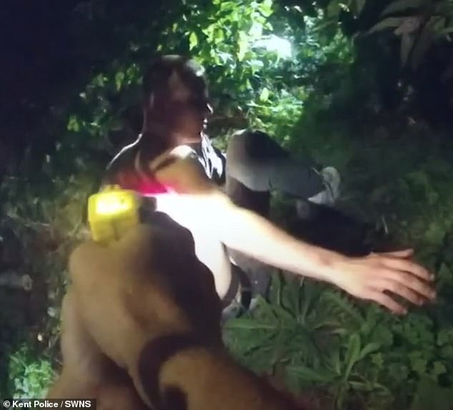 This is the moment a teenage thug who stabbed his neighbour more than 50 times in a 'brutal' attack was found cowering in bushes by police