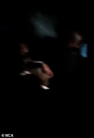 Videos show men and women banging the sides of the darkened trailer and begging the driver to 'open the door' so they can get out