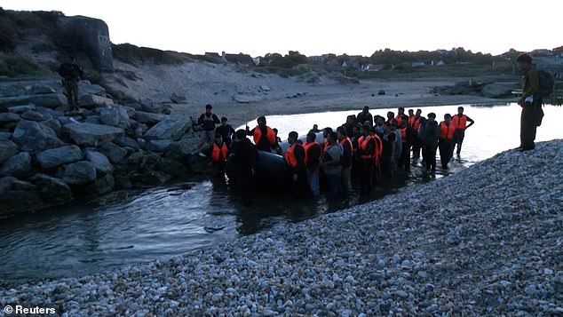 Video footage shows how a group of refugees and migrants aboard the boat were attempting to follow a short stream leading to the sea just metres away
