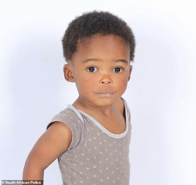 A major search effort was launched after Kuneuwe Shalaba, 33, reported her child - who she at first claimed was a boy but later admitted was a girl - missing. Shalaba she said 'he' was snatched from her by 3 kidnappers who sped off in a VW Golf near Johannesburg. Pictured: Kutlwano Shalaba