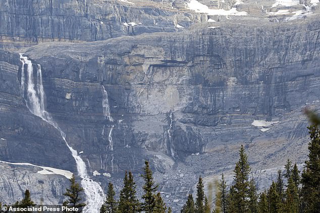 Pictured: The aftermath of the deadly rockslide. One person was confirmed dead and three other were taken to hospitals
