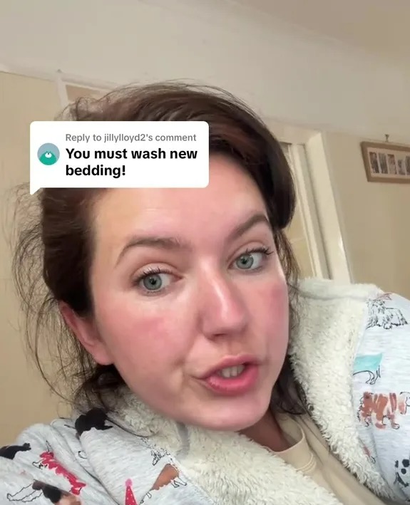 Woman in a robe responds to a comment that says "You must wash new bedding!"