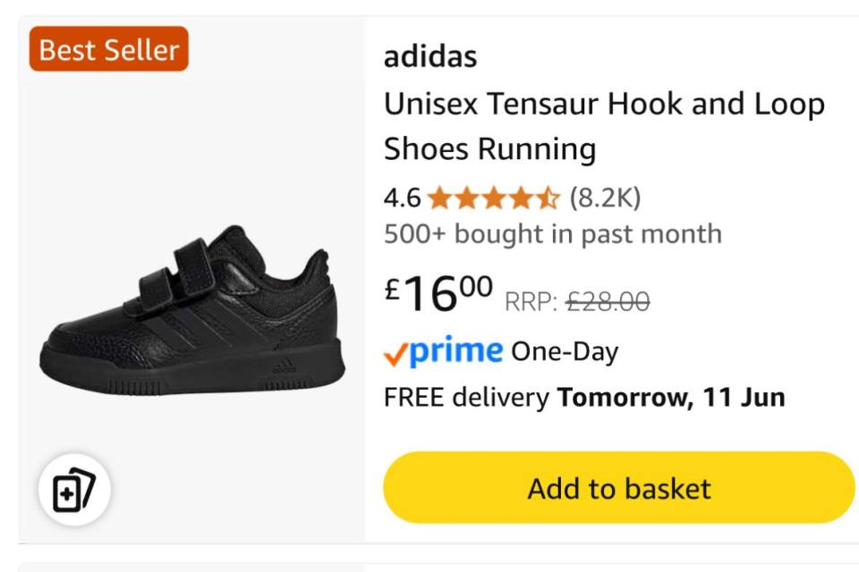 Black Adidas Tensaur hook and loop running shoes.