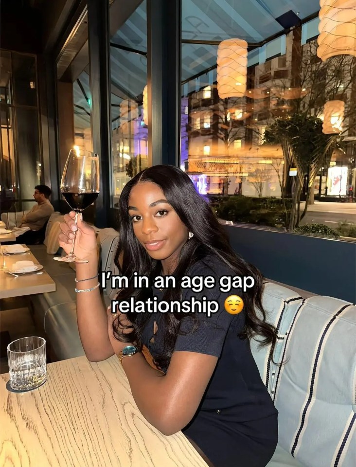 Woman in a restaurant holding a glass of wine, text overlay reads "I'm in an age gap relationship"
