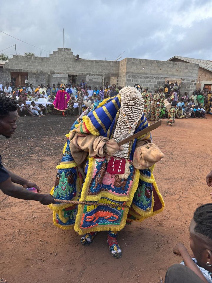 Zangbeto, a Voodoo guardian figure in Ouidah, Benin, during a ceremony.