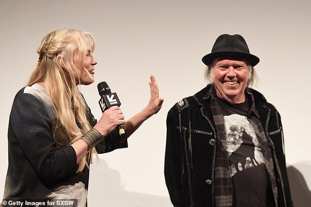 Neil Young and his actress wife Daryl Hannah, who starred in Blade Runner and Kill Bill, and is 15 years his junior