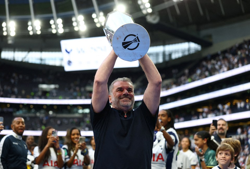 FILE PHOTO: Soccer Football - Premier League - Tottenham Hotspur v Brighton & Hove Albion - Tottenham Hotspur Stadium, London, Britain - May 25, 2025 Tottenham Hotspur manager Ange Postecoglou holds aloft the Europa League trophy during a lap of appreciation after the match Action Images via Reuters/Matthew Childs EDITORIAL USE ONLY. NO USE WITH UNAUTHORIZED AUDIO, VIDEO, DATA, FIXTURE LISTS, CLUB/LEAGUE LOGOS OR 'LIVE' SERVICES. ONLINE IN-MATCH USE LIMITED TO 120 IMAGES, NO VIDEO EMULATION. NO USE IN BETTING, GAMES OR SINGLE CLUB/LEAGUE/PLAYER PUBLICATIONS. PLEASE CONTACT YOUR ACCOUNT REPRESENTATIVE FOR FURTHER DETAILS../File Photo