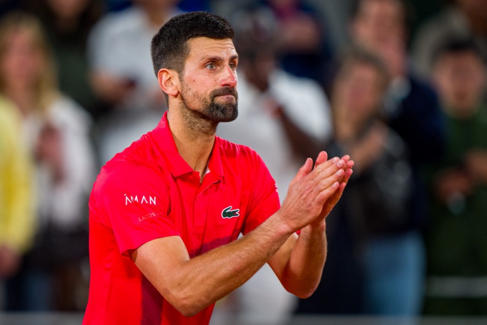 PARIS, FRANCE - JUNE 06: Novak Djokovic of Serbia acknowledges the crowd as he leaves the court after defeat against Jannik Sinner of Italy during the Men's Singles Semi Final match on Day Thirteen of the 2025 French Open at Roland Garros on June 06, 2025 in Paris, Francea¿¿ (Photo by Andy Cheung/Getty Images)