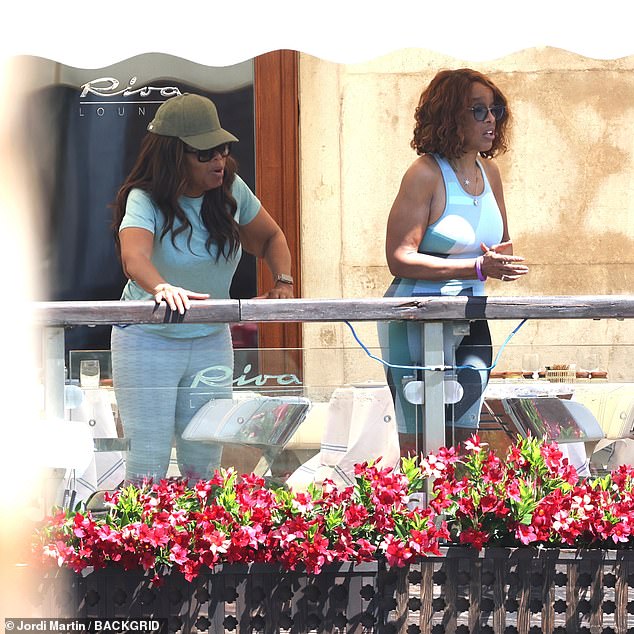 Oprah (L) showed off her slimmed-down figure as she arrived in Venice for the lavish wedding of Lauren Sanchez and Jeff Bezos on Friday with her friend Gayle King (R)