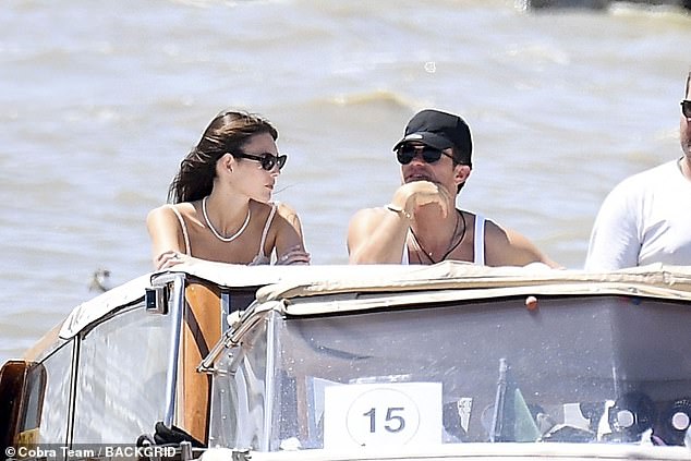 The actor looked relaxed in a fitted T-back T-shirt and tan khakis