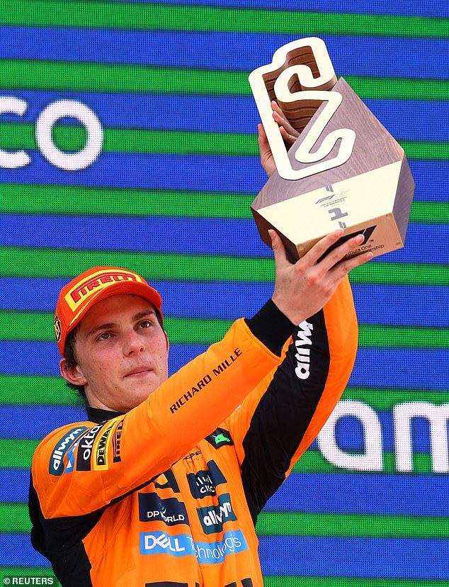 Oscar Piastri (pictured) has claimed his tenth victory of the Formula One season, fending off his team-mate Lando Norris from pole position