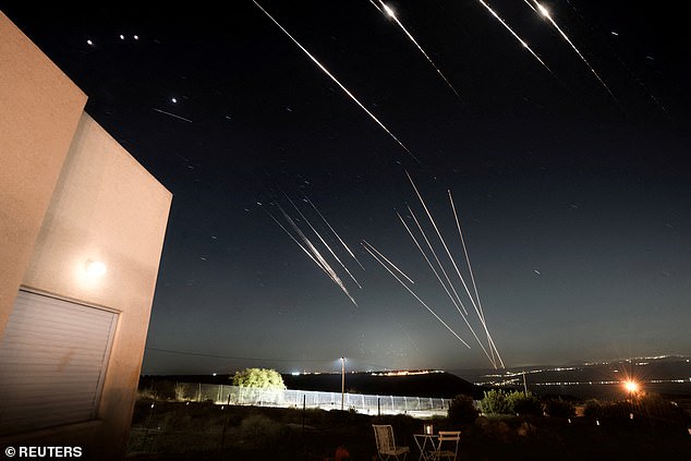Missiles launched from Iran are intercepted as seen from the Israeli-occupied Golan Heights