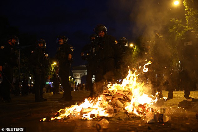 A teenager was stabbed to death and 426 people were arrested during overnight unrest