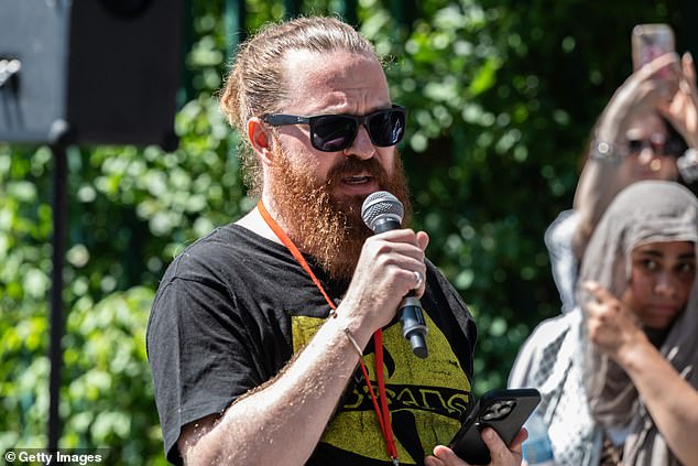Asa Winstanley of Electronic Intifada speaks to the protest on June 30, 2025 in London, England.