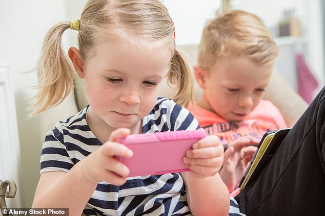 Parents are being warned to limit children's screen time after a study found it could lead to them having smaller brains and lower intelligence