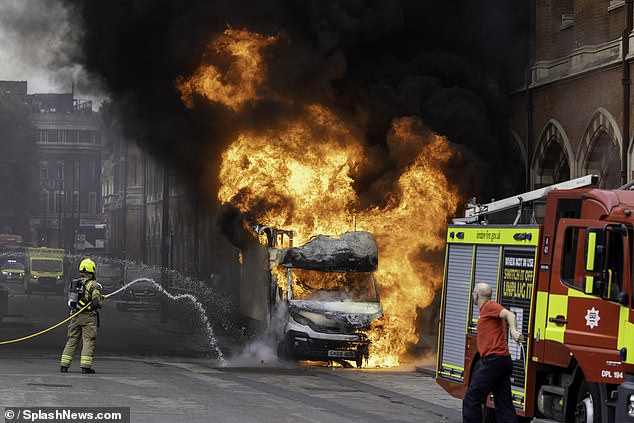 A van was destroyed by fire which erupted outside St Pancras station in London this morning