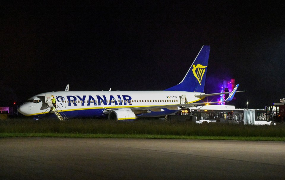 Ryanair passenger jet on the tarmac after experiencing turbulence.