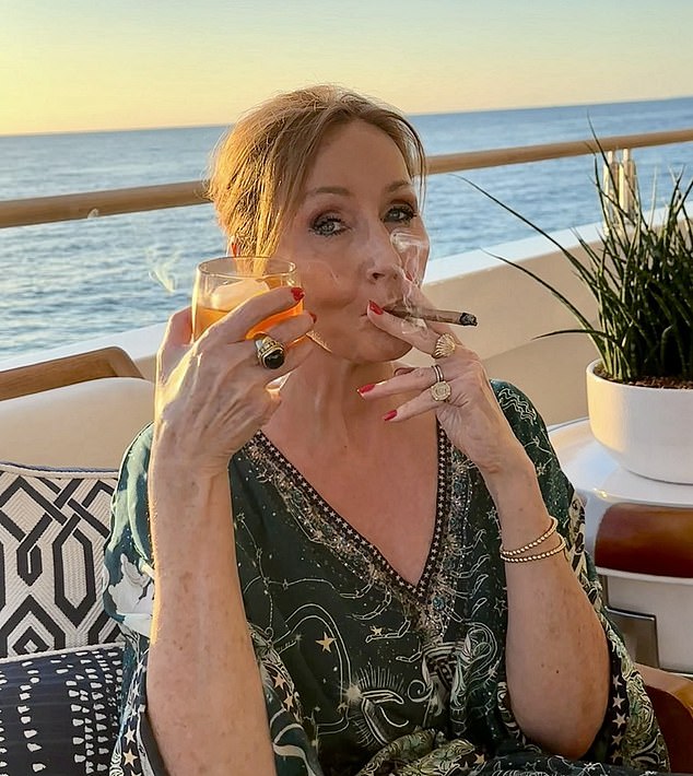 Harry Potter creator JK Rowling (pictured celebrating on her yacht a recent Supreme Court ruling on biological sex) has been arguing with critics over her views on gender