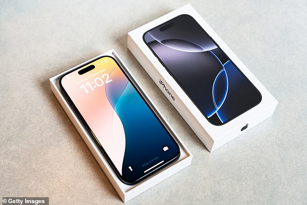 A close up of an Apple iPhone 16 Pro in retail packaging is seen in this September 2024 photo