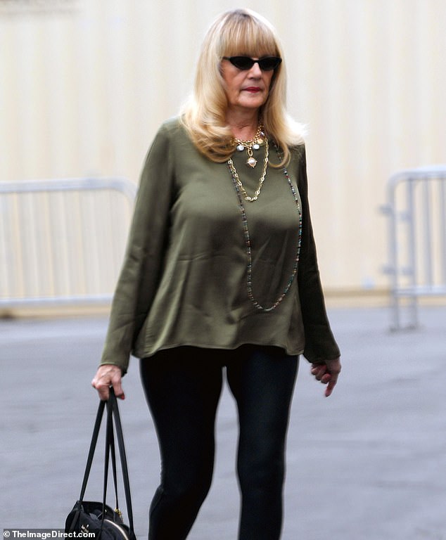 A former Playboy magazine star stepped out for a rare outing in Los Angeles over the past weekend - can you guess who it is?