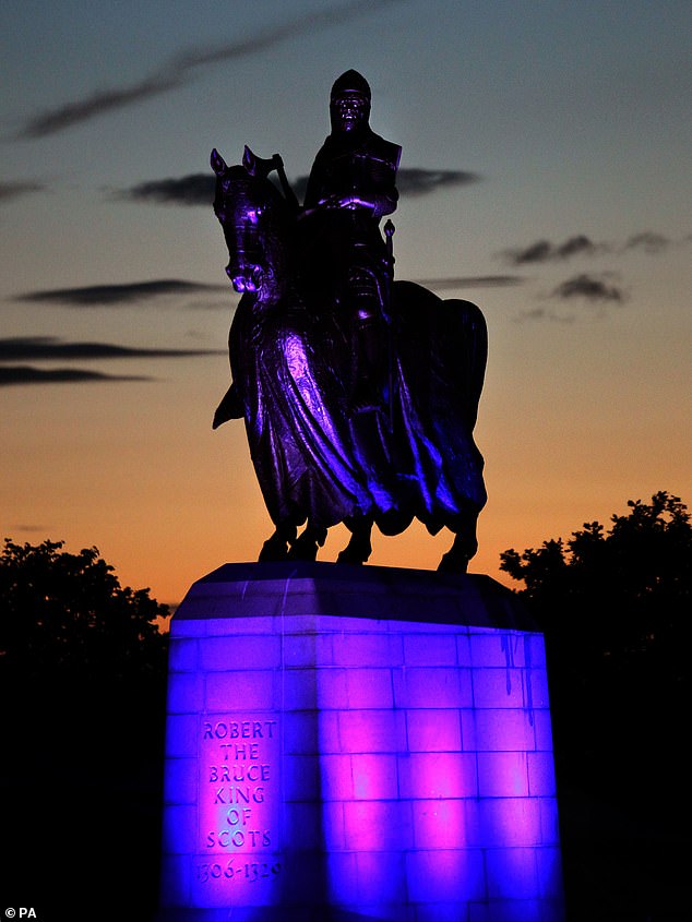 Officers were called about a man heard singing the patriotic folk song Flower Of Scotland at an English railway station - the tune was written in the 1960s to mark Robert The Bruce's (statue above) victory over Edward II at Bannockburn in 1314