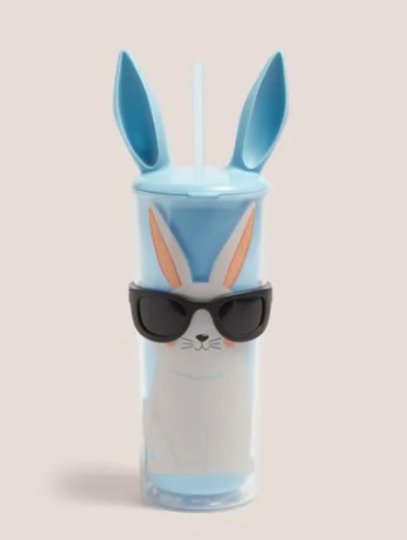 Blue bunny-eared tumbler with sunglasses.