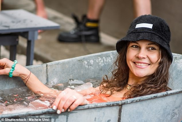 Serving up a bone-chilling shock to the system, cold water plunging has become a wellness trend beloved by millions for its supposed health benefits (stock image)