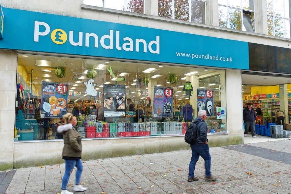 Poundland storefront with Halloween decorations in the window.
