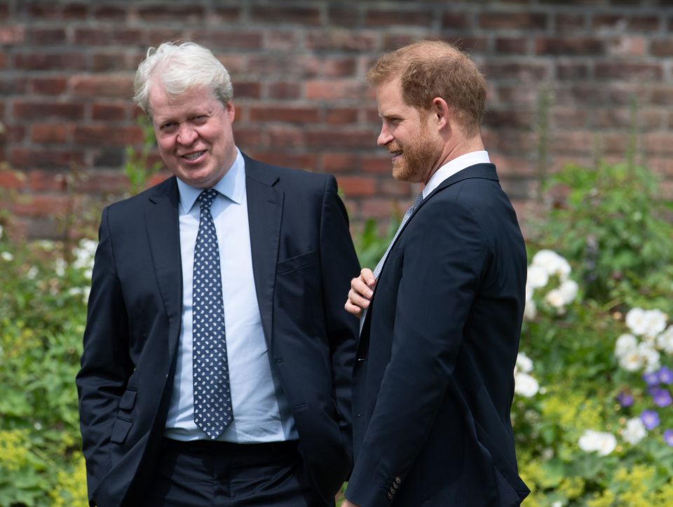 Prince Harry and Earl Spencer at the unveiling of Princess Diana's statue.