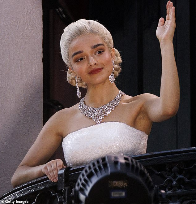 Members of the public watch Rachel Zegler perform "Don't Cry For Me Argentina" live on the balcony as she plays Eva Peron in "Evita" at the London Palladium