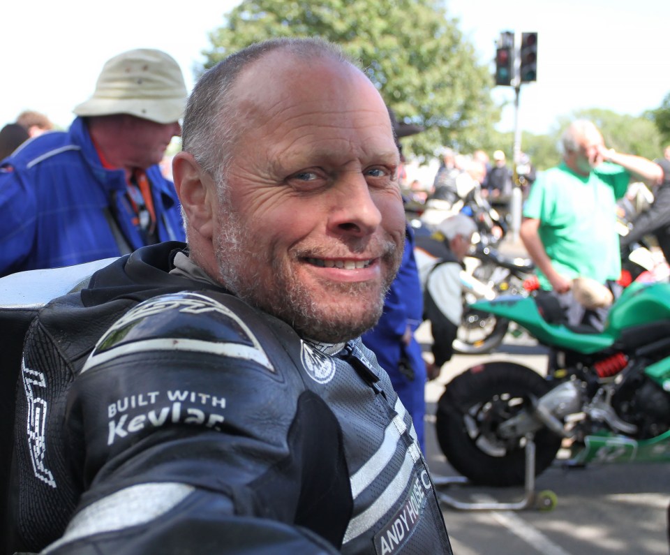 Close-up of Mark Parrett, Isle of Man TT racer, who suffered a bird strike, showing his injured arm.