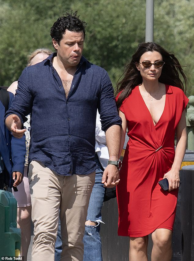 Sebastien Bowen, 45, was spotted holding hands and with his arm around glamorous Susann, 39, who's the Head of Investor Relations at a London finance firm