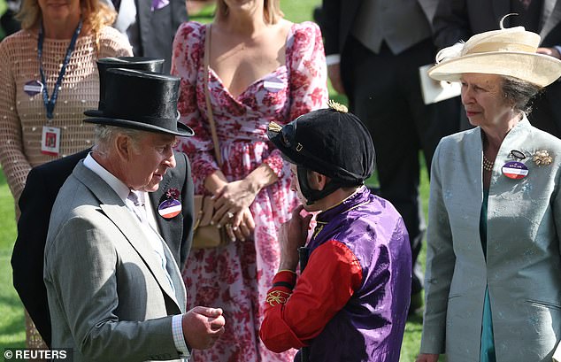 Before the race, King Charles exchanged words with royal jockey Ryan Moore in the paddock